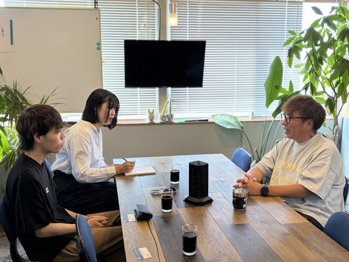 経営者への取材の様子